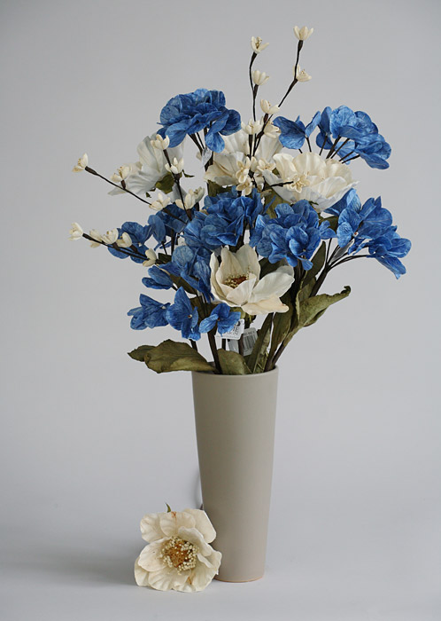 Arrangement of permanent value (celulose flowers+vase)