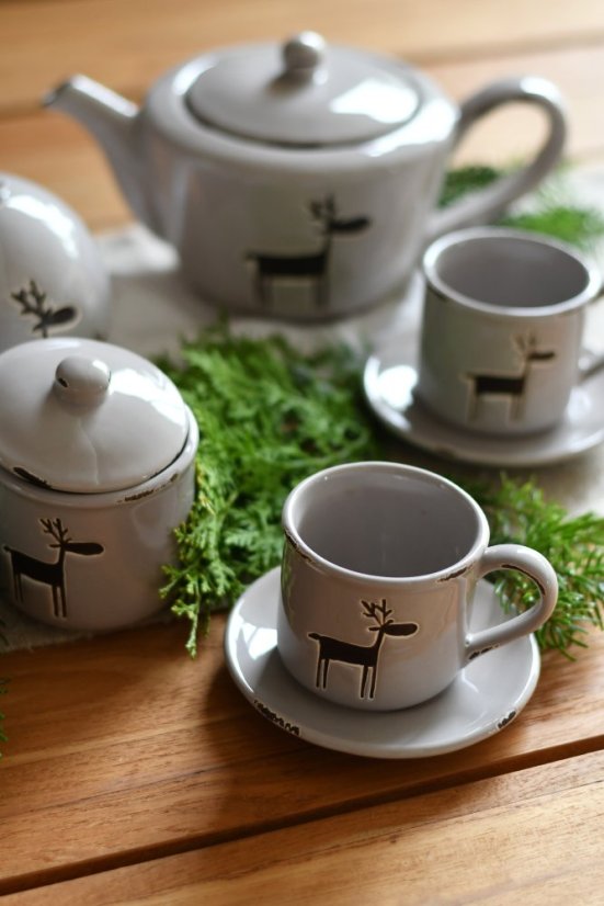 cup and saucer with reindeer - ceramics