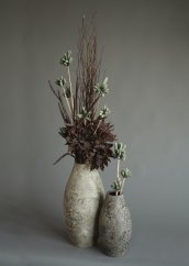 Arrangement of permanent value (artificial flowers+ vase)