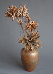 Arrangement of permanent value (artificial flowers+ vase)